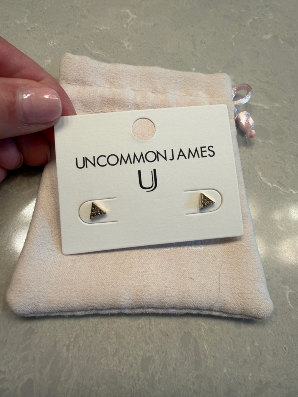 Uncommon James Gold Triangle Stud Earrings with Pale Pink Pouch